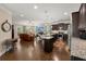 Open-concept kitchen with stainless steel appliances, granite counters, and a breakfast bar at 207 Brutus Ln, Summerville, SC 29485