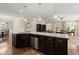 Kitchen island with stainless steel dishwasher and granite countertops in an open floor plan at 207 Brutus Ln, Summerville, SC 29485