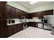 A well-appointed kitchen with stainless steel appliances, ample cabinet space, and tile flooring at 207 Brutus Ln, Summerville, SC 29485