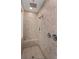 Shower featuring dual shower heads, tiled walls, a built-in seat, and convenient shower niche at 207 Brutus Ln, Summerville, SC 29485