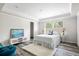 Bright bedroom features ample natural light, recessed ceiling, and stylish decor at 208 General Moultrie Dr, Bonneau, SC 29431