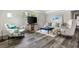 Cozy living room with stylish decor and wood flooring at 208 General Moultrie Dr, Bonneau, SC 29431