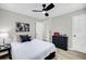Bedroom has a dark ceiling fan, wood floors, and a closet, with lots of storage space at 209 Pineview Dr, Goose Creek, SC 29445