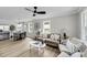 Inviting living room with lots of natural light, a ceiling fan, and an open concept floor plan at 209 Pineview Dr, Goose Creek, SC 29445