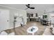 Spacious open concept living area connecting the living room, dining area, and modern kitchen at 209 Pineview Dr, Goose Creek, SC 29445