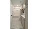 Charming bathroom features a shower-tub combo with patterned tile flooring at 21 George St # 102, Charleston, SC 29401