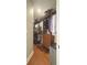Spacious walk-in closet with custom shelving and ample storage space at 21 George St # 102, Charleston, SC 29401