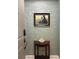 Cozy entryway with an antique table and artwork at 21 George St # 102, Charleston, SC 29401