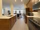 Modern kitchen features stainless steel appliances, granite countertops, and open floorplan at 21 George St # 102, Charleston, SC 29401