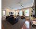 Inviting living room with hardwood floors, large windows, and stylish furnishings at 21 George St # 102, Charleston, SC 29401
