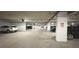 Large indoor parking garage with clearly marked spaces providing tenant parking at 21 George St # 102, Charleston, SC 29401