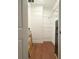 Bright walk-in closet with wire shelving and hardwood floors at 21 George St # 102, Charleston, SC 29401
