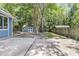 Spacious backyard featuring a shed, lawn, and a fenced yard, offering plenty of room for outdoor activities at 211 White Church Ln, Summerville, SC 29485