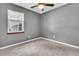 Neutral bedroom features one window providing lots of natural light and neutral carpeting at 211 White Church Ln, Summerville, SC 29485