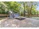 Inviting wooden deck with blue shed, decorative planters and ample space for outdoor entertaining at 211 White Church Ln, Summerville, SC 29485