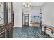 Open foyer with stone floors leading into a spacious living area at 211 White Church Ln, Summerville, SC 29485