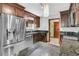 Modern kitchen with stainless steel appliances, granite countertops, and wooden cabinets at 211 White Church Ln, Summerville, SC 29485