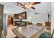 Open-concept kitchen with dark wood cabinets and stainless steel appliances at 211 White Church Ln, Summerville, SC 29485