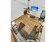 Spacious living room features hardwood floors, a ceiling fan, and a large TV screen for entertainment at 211 White Church Ln, Summerville, SC 29485