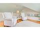 Comfortable living area with cozy seating, window seat, and hardwood floors at 22 Beachwood East, Isle of Palms, SC 29451