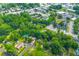 Aerial view of houses in wooded residential area, showing proximity to commercial district at 230 Azalea Ct, Moncks Corner, SC 29461