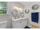 Well-lit bathroom features a dual sink vanity with modern fixtures, and classic design at 230 Azalea Ct, Moncks Corner, SC 29461