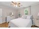 Comfortable bedroom with wood floors, lots of natural light, and classic decor at 230 Azalea Ct, Moncks Corner, SC 29461