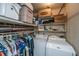 Laundry room with washer, dryer, and storage shelving at 2567 Mona Ave, Charleston, SC 29414