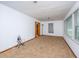 Carpeted living room with bright white walls and lots of natural light at 2567 Mona Ave, Charleston, SC 29414