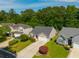 Aerial shot of a lovely neighborhood, showcasing well-kept homes and lush green lawns at 261 Sweet Alyssum Dr, Ladson, SC 29456