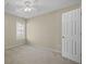Cozy bedroom featuring neutral paint, a ceiling fan, carpeted floors, and a window with blinds at 261 Sweet Alyssum Dr, Ladson, SC 29456