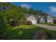 Inviting home with manicured landscaping and a two-car garage, perfect for families at 261 Sweet Alyssum Dr, Ladson, SC 29456