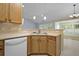 Functional kitchen with wooden cabinetry, a modern faucet, and a clean aesthetic at 261 Sweet Alyssum Dr, Ladson, SC 29456