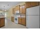 Bright kitchen featuring white appliances, light wood cabinets, and a functional design at 261 Sweet Alyssum Dr, Ladson, SC 29456