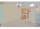 Charming kitchen with wood cabinets, white appliances, and a functional layout at 261 Sweet Alyssum Dr, Ladson, SC 29456
