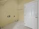 Practical laundry room with shelving and utility connections at 261 Sweet Alyssum Dr, Ladson, SC 29456