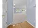 Spacious, light-filled living room with hardwood floors, neutral walls, and ample natural light at 261 Sweet Alyssum Dr, Ladson, SC 29456