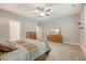 Bedroom with ceiling fan, two dressers, carpeted floor and view to a closet at 2652 Private Lefler Dr, Johns Island, SC 29455