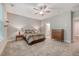 Spacious bedroom with carpet floors, natural light, and a ceiling fan at 2652 Private Lefler Dr, Johns Island, SC 29455
