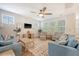 Inviting living room with hardwood floors, comfy seating, and plenty of natural light at 2652 Private Lefler Dr, Johns Island, SC 29455