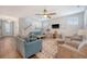 Bright living room with hardwood floors, comfortable seating, and a ceiling fan at 2652 Private Lefler Dr, Johns Island, SC 29455