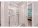 Glass enclosed shower with tile surround and shower head at 2652 Private Lefler Dr, Johns Island, SC 29455