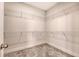 Walk-in closet with wall-mounted wire shelving and carpeted floors at 2652 Private Lefler Dr, Johns Island, SC 29455