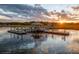 An idyllic waterfront gazebo offers stunning sunset views at 2652 Private Lefler Dr, Johns Island, SC 29455