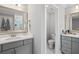 Bathroom with double sink vanity and mirrors plus an enclosed toilet room at 2802 Cavalcade Cir, Johns Island, SC 29455