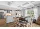 Dining area with a dark wood table, stylish chairs, and decorative ceiling at 2802 Cavalcade Cir, Johns Island, SC 29455