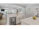 Open concept kitchen with stainless steel dishwasher and white cabinetry, perfect for modern living at 2802 Cavalcade Cir, Johns Island, SC 29455