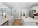 Spacious kitchen with white cabinetry, stainless steel appliances, and a center island at 2802 Cavalcade Cir, Johns Island, SC 29455