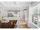 Bright and airy kitchen with a breakfast bar, stainless steel appliances, and white cabinets at 2802 Cavalcade Cir, Johns Island, SC 29455