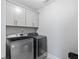 The laundry room features new front-loading washing and drying machines at 2802 Cavalcade Cir, Johns Island, SC 29455